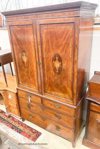 A George III inlaid mahogany linen press (lacks slides), wid...