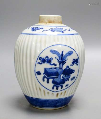 A Chinese blue and white fluted jar, 15cm