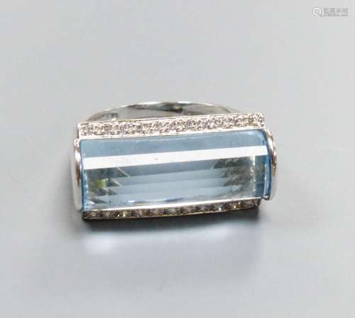 A modern 18k white metal, fancy cut blue topaz and diamond c...