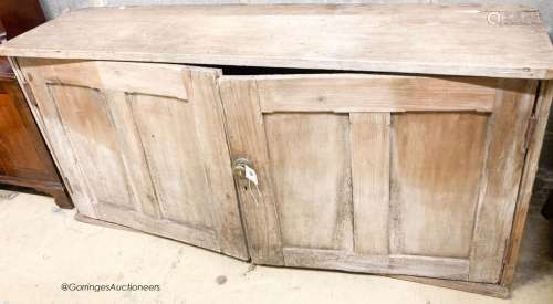 A Victorian pine two door low cupboard, width 122cm, depth 3...