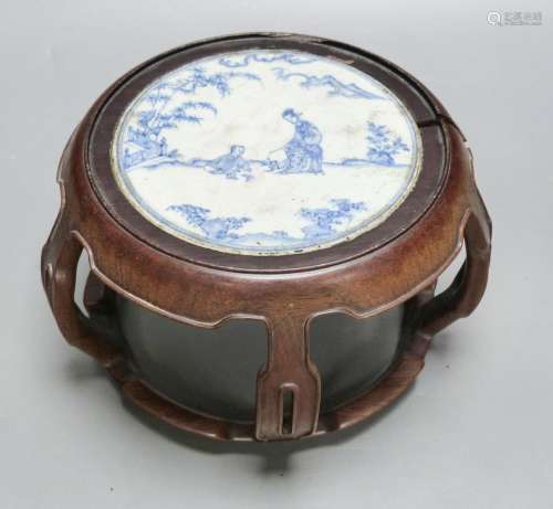 A 19th century Chinese blue and white circular tile inset ho...