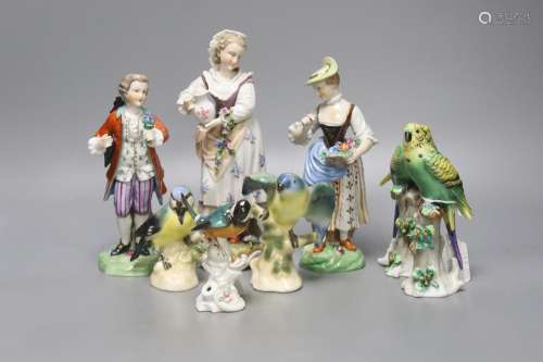 Three Continental figures and a collection of bird ornaments...