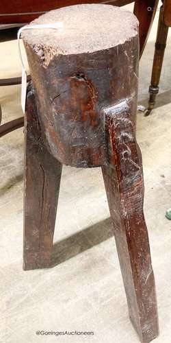 A provincial chopping block, height 68cm