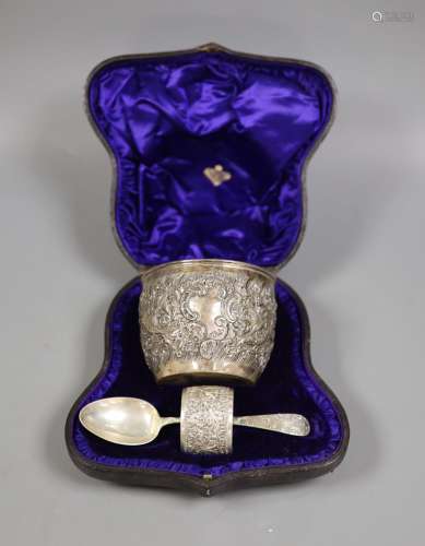 A cased late Victorian embossed silver christening bowl, spo...