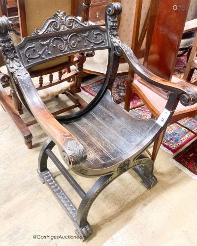 An ebonised Sagrada style elbow chair