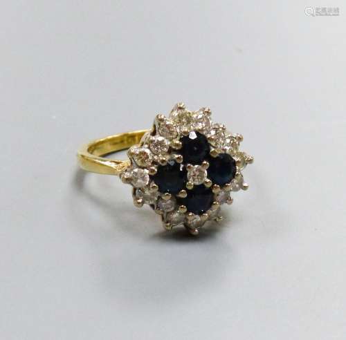 A modern 18ct gold, sapphire and diamond set diamond shaped ...