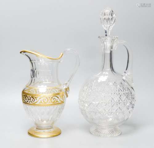 A Baccarat gilt and cut glass jug and a strawberry cut glass...
