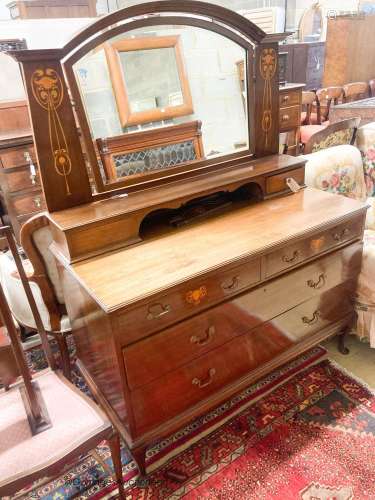 An Edwardian Art Nouveau inlaid mahogany dressing chest, wid...