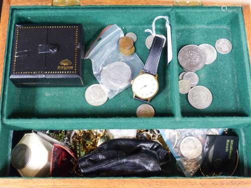 A quantity of assorted costume jewellery and coins etc. in a...