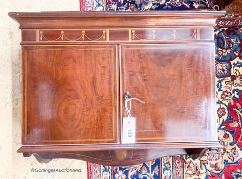 An Edwardian mahogany hanging two door wall cabinet, width 5...