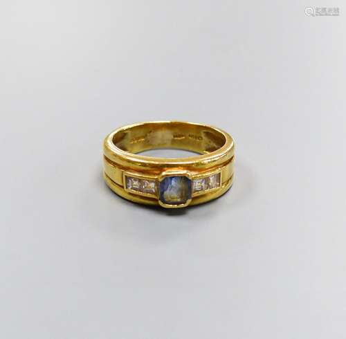 A modern 18ct gold, single stone sapphire and four stone dia...