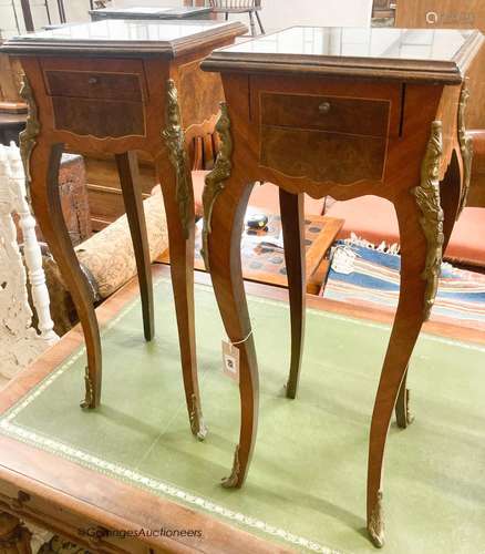 A pair of French style mahogany and walnut jardiniere stands...