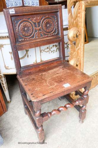 A late 17th century oak back stool, length 46cm, depth 38cm,...