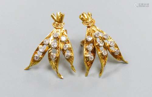 A pair of modern yellow metal and nine stone diamond chip se...