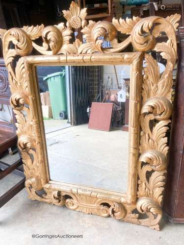 A 20th century Florentine style gilt wood mirror, width 84cm...