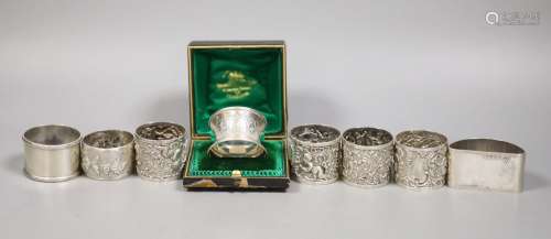 A set of four Victorian embossed silver napkin rings, A & J....