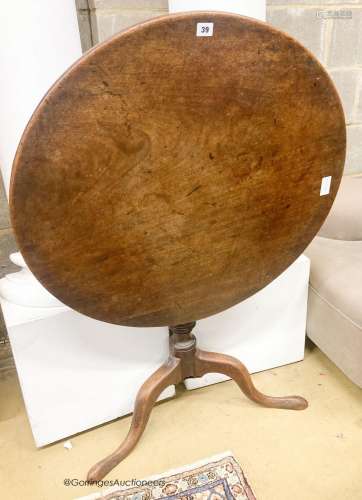 A George III circular mahogany tilt top tea table, diameter ...