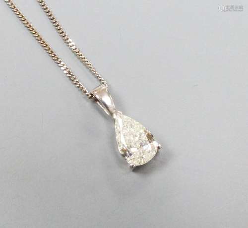 A modern white metal and solitaire pear shaped diamond set p...