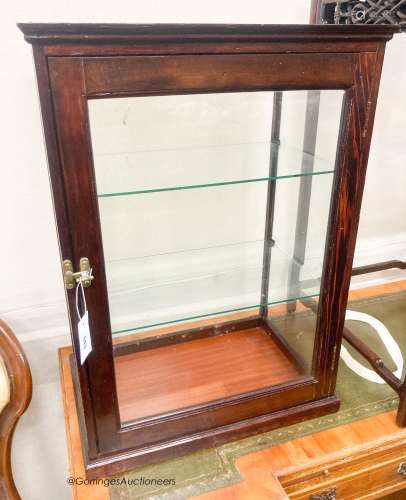 An early 20th century pine and mahogany counter top display ...