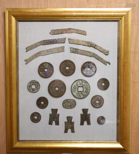 A quantity of framed Chinese coins