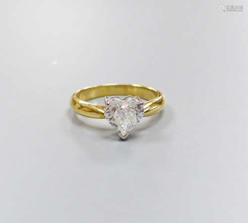 A modern 18ct gold and solitaire heart shaped diamond ring, ...