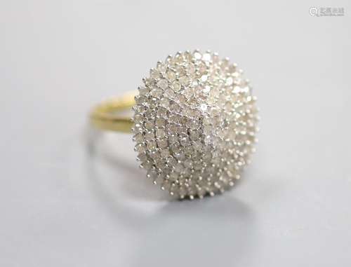 A modern 18kt and pave set diamond oval cluster dress ring, ...