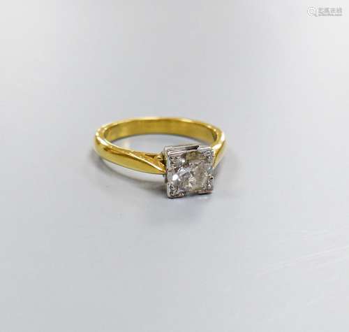 A modern 18ct gild and solitaire diamond ring, size M, gross...