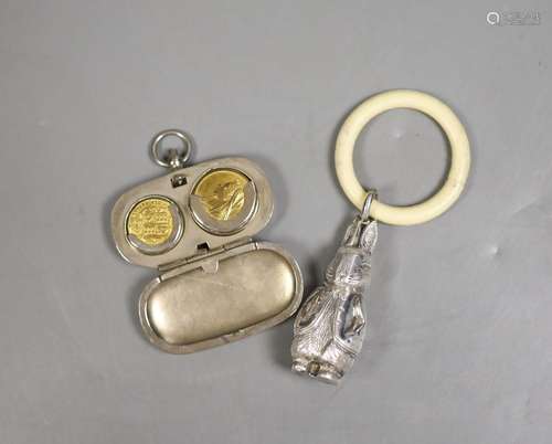 A silver plated sovereign case with faux sovereigns and a ch...