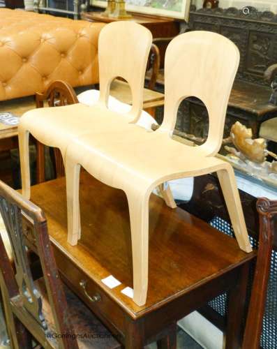 A pair of ‘Comunity’ ergonomic design children’s chairs, 55c...
