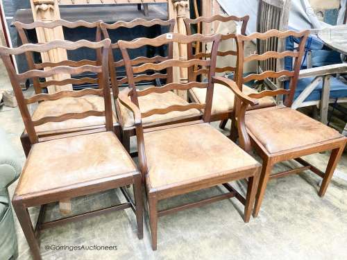 A set of six George III mahogany ladderback dining chairs wi...