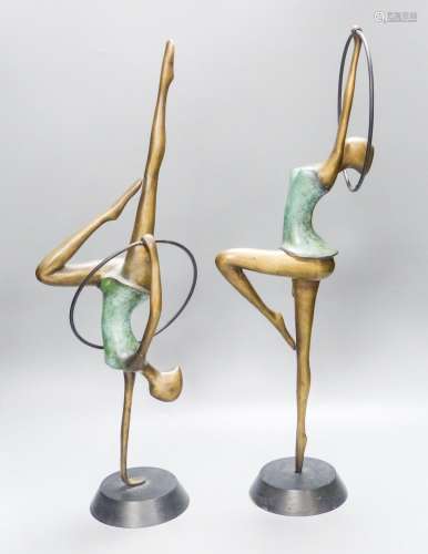 A pair of Hagenauer style bronze figures of hoop dancers, 51...