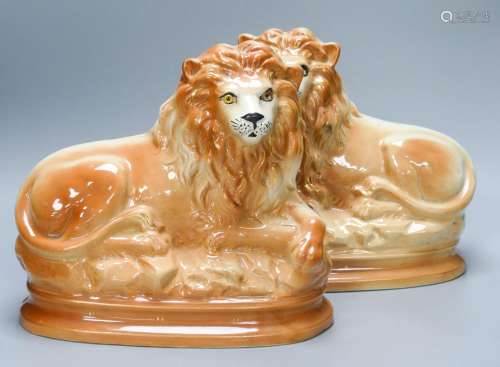 A pair of Staffordshire pottery 'lion' figures30cm