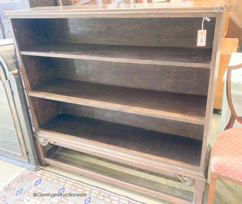 A 1920's oak open bookcase, length 126cm, depth 32cm, height...