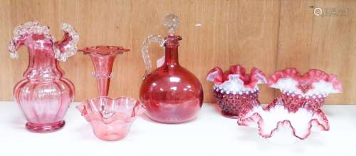 A group of Victorian Cranberry glass dishes, two vases and a...