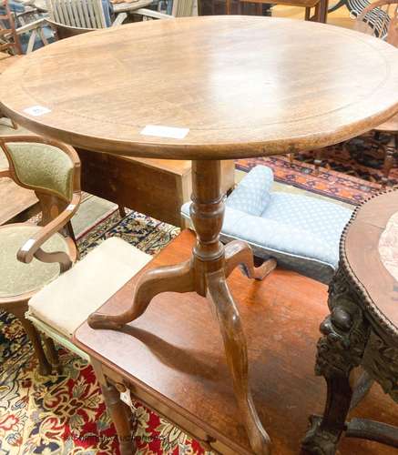 A George III circular mahogany tilt top tea table, diameter ...