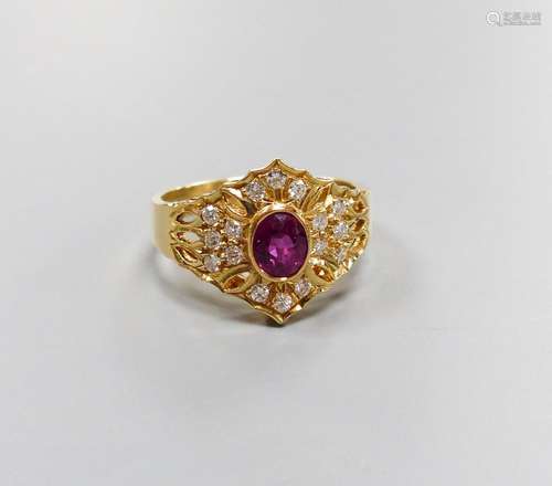 A modern 14ct gold, single stone ruby and diamond chip clust...