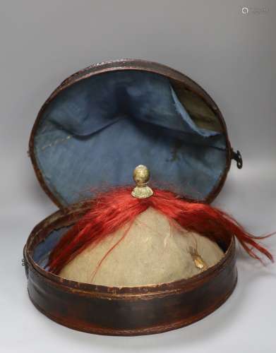 A Chinese late Qing mandarin hat, with gilt finial and origi...
