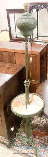 An early 20th century painted brass and onyx telescopic lamp...