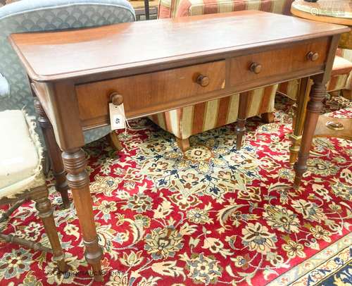 A Victorian mahogany two drawer side table, width 106cm, dep...