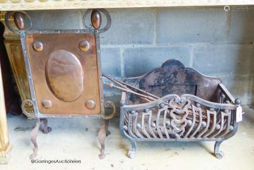 A heavy wrought iron fire basket, width 55cm, depth 28cm, he...