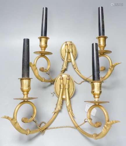 A pair of twin branch gilt metal sconces, 27.5 cm