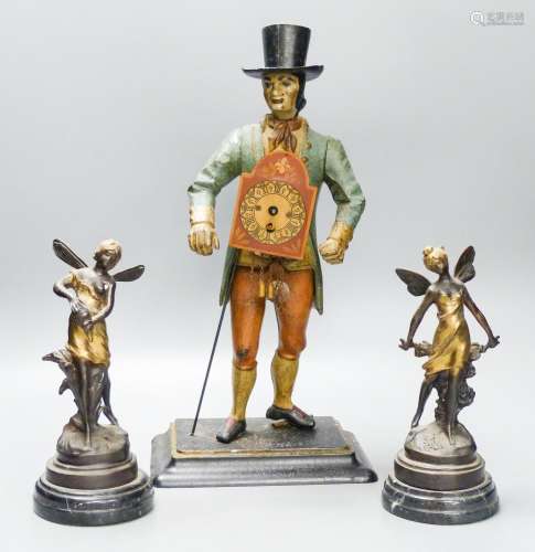 A painted cast iron figure all mantle timepiece and a pair o...