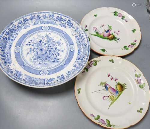 An ironstone cheese stand and a pair of French faience plate...