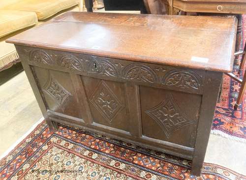 An 18th century carved oak coffer, length 95cm, depth 47cm, ...