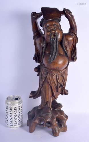 A LARGE 20TH CENTURY CHINESE CARVED ROOTWOOD FIGURE OF A MAL...