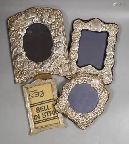 Four assorted modern silver mounted photograph frames includ...