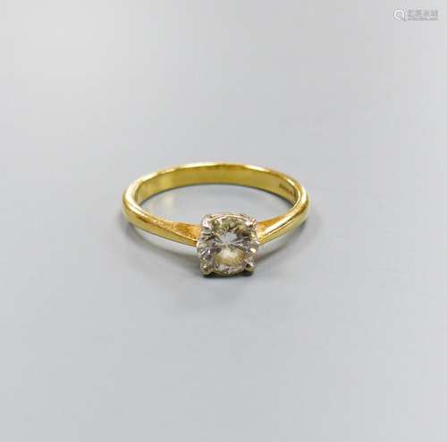 A modern 18ct gold and solitaire diamond ring, size O, gross...