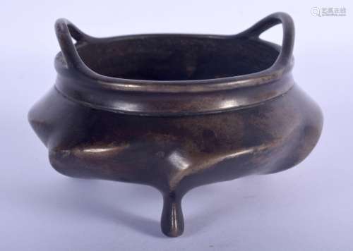 A 19TH CENTURY CHINESE TWIN HANDLED BRONZE CENSER Qing, bear...