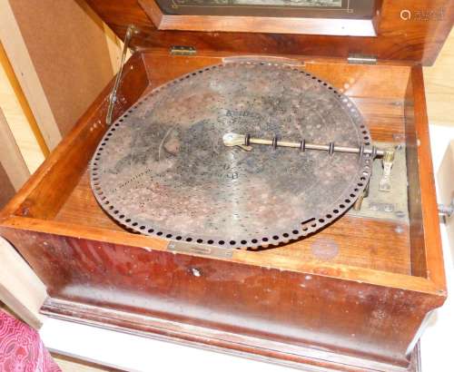 A Walnut and marquetry cased polyphon, 54cm and various 40cm...