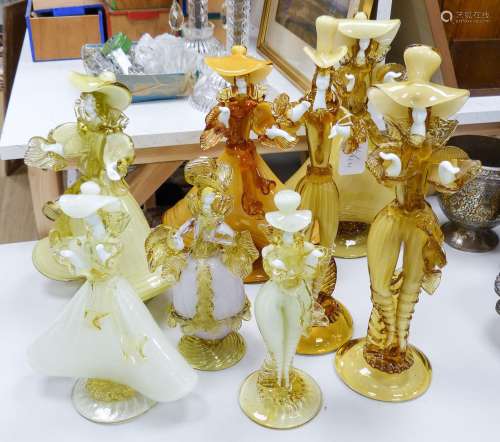 A collection of eight Murano amber glass figures, tallest 42...